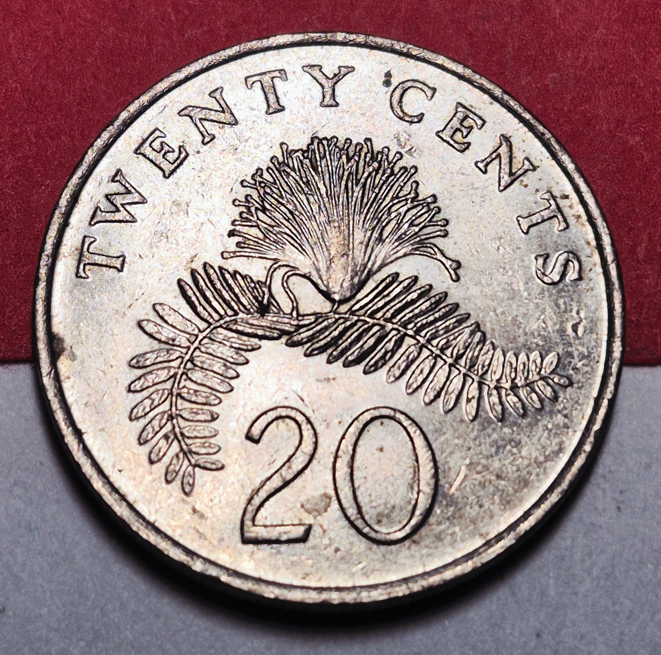 1985 Republic of Singapore 20 Cents — Cold War Era — Powder Puff Plant — VF+ to EF